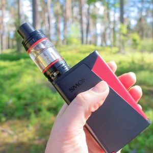 hand holding large tank e-cigarette