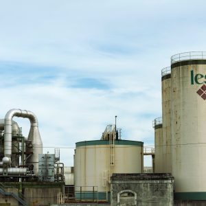 industrial building against a cloudy skyline