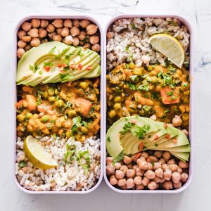 avocado and bean salad in white dishes