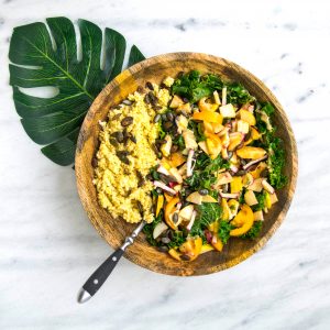 vegetable salad on a tropical leaf and marble counter top