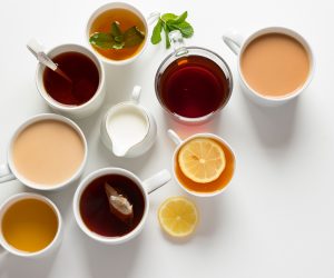 close up of various teas in cups