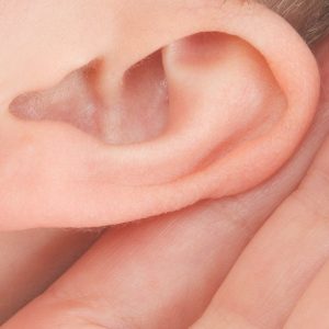 ear with hand cupped around it