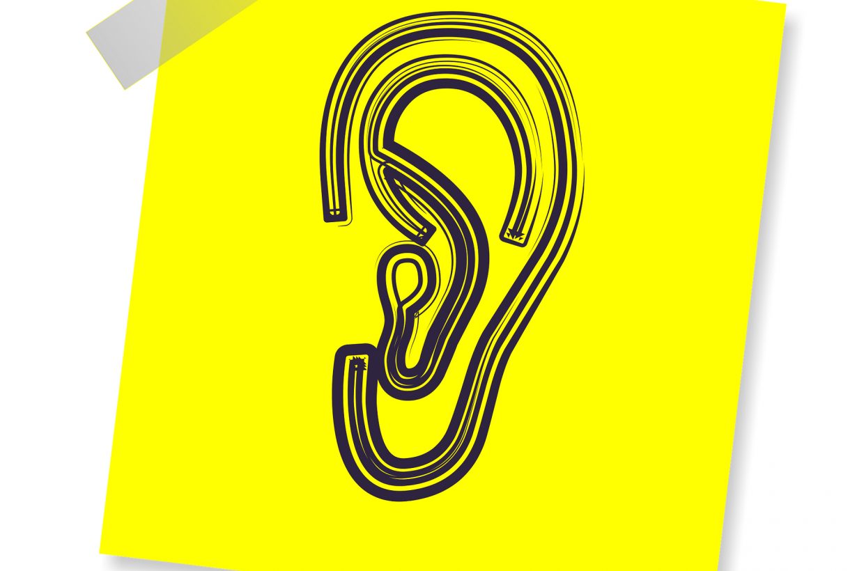 illustration of an ear on a yellow post it