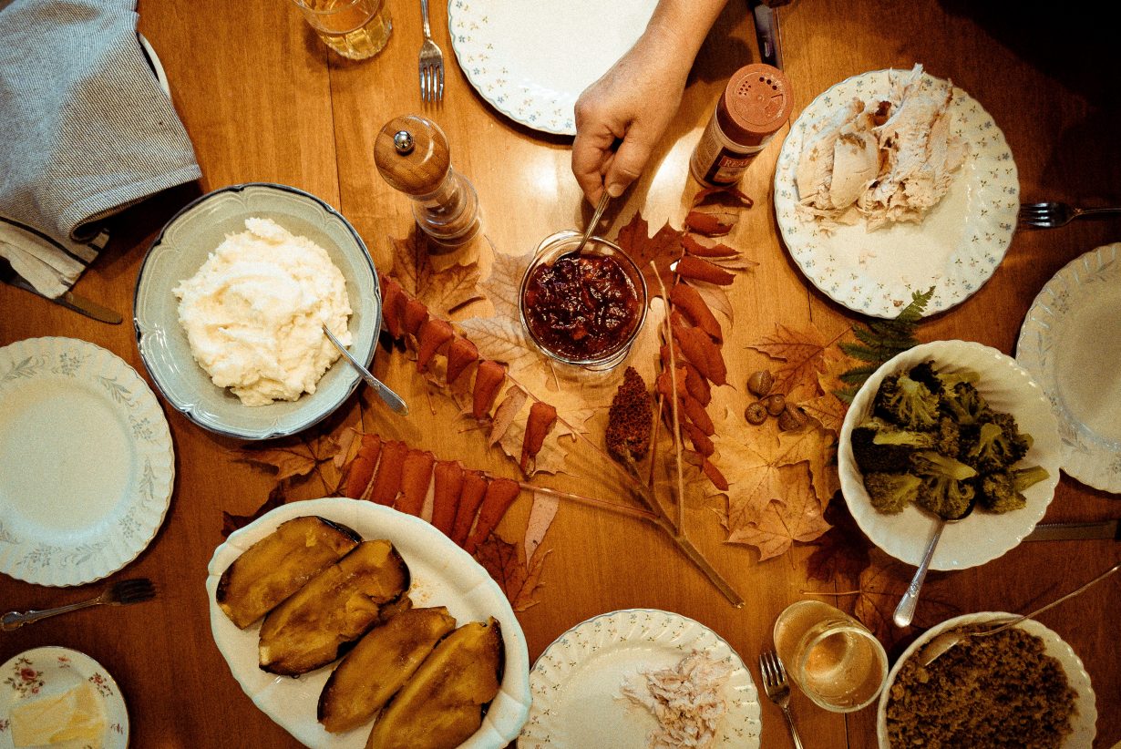 birds eye view of a Thanksgiving dinner spread on a table