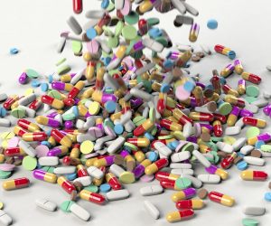 image of a bunch of pills spilling into a pile