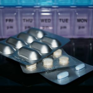 picture of 3 sheets of different medication