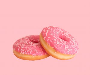 donuts covered in pink frosting