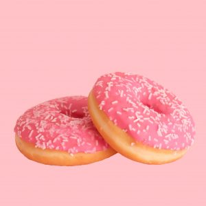 donuts covered in pink frosting