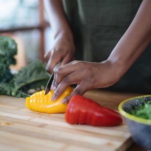 woman cutting vegetables