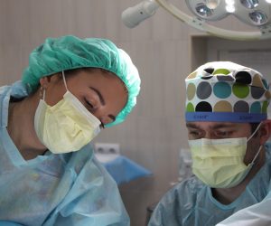 two surgeons performing surgery