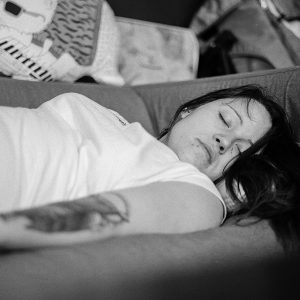 woman sleeping on a couch