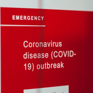 Coronavirus sign on a wall
