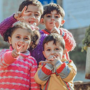 little kids standing together