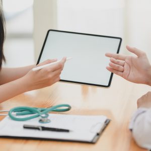 person talking to a doctor