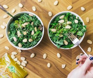 two green salads with nuts