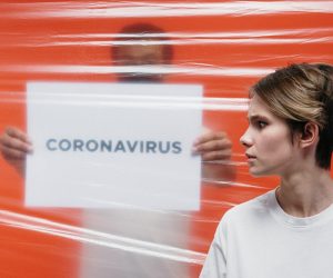 person quarantined with coronavirus sign