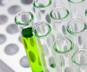 glass vials and bright green liquid
