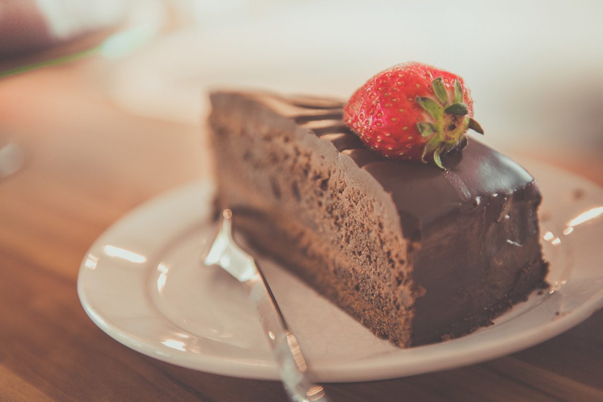 decadent chocolate cake with a strawberry