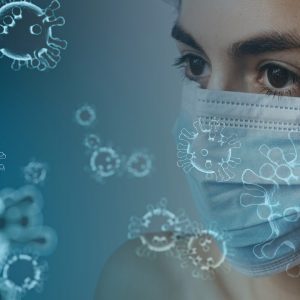 woman wearing face mask and virus molecules