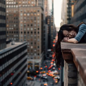 woman relaxing in a busy city