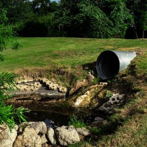 sewage pipes in grass