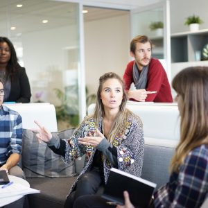 woman speaking to a group of people