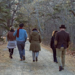 people walking outside in a group