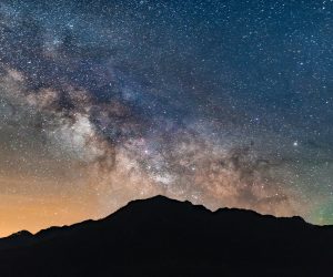 mountain against the milkyway in the night sky