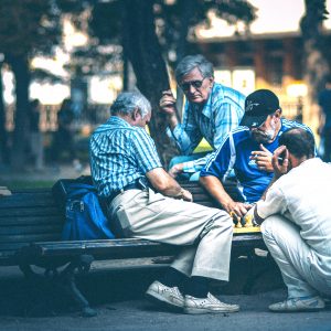 men playing chess at a park