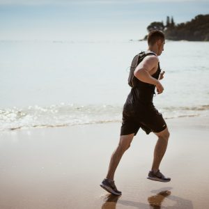 man running on beach