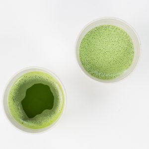 matcha green tea in white tea cups
