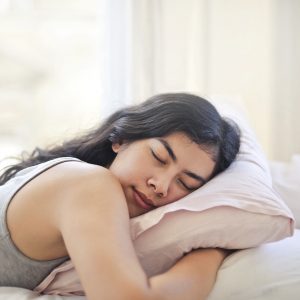 woman sleeping on a pillow