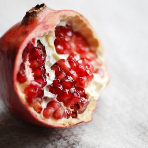 pomegranate against a white background