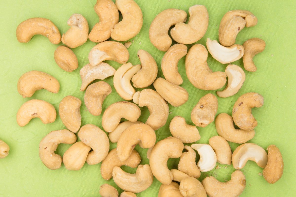 cashew nuts on a green background
