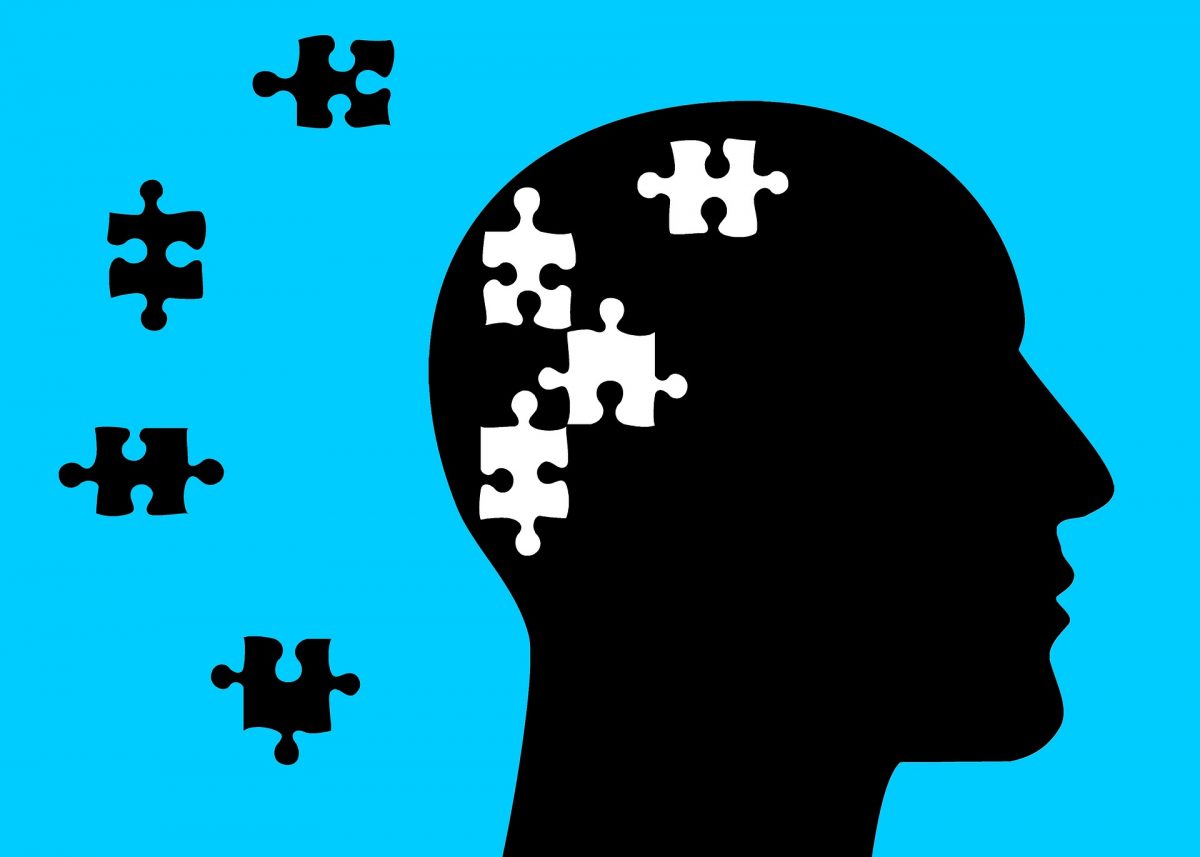 illustration of a head with puzzle pieces missing in the head