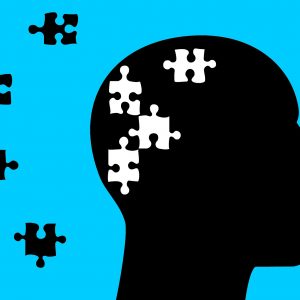 illustration of a head with puzzle pieces missing in the head