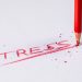 the word stress written in red pencil
