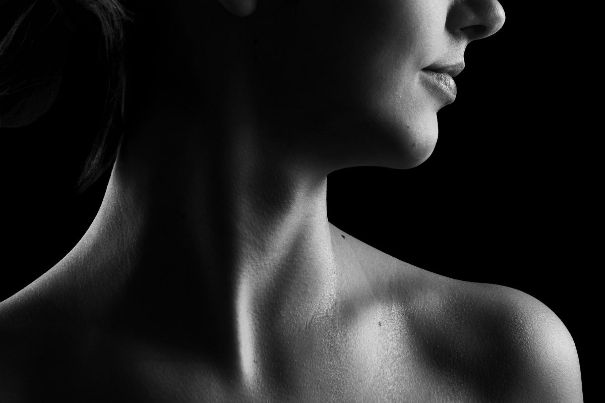 photo of a woman's neck and upper chest