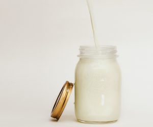 a mason jar full of milk
