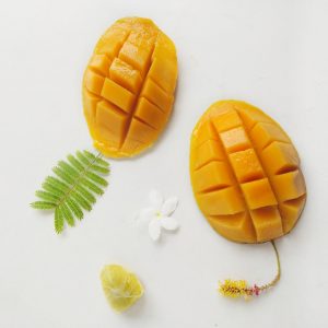 mangoes against a white background