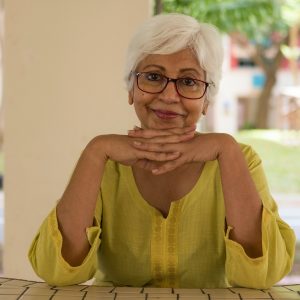 older woman smiling at the camera